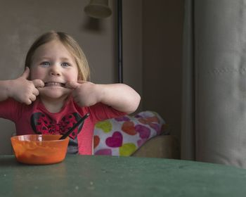 Portrait of cute girl at home