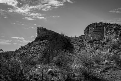 Low angle view of fort on mountain against sky