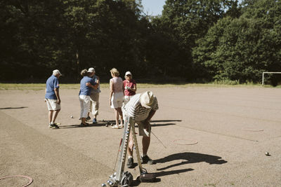 People playing petanque
