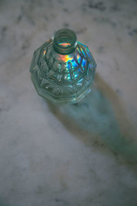 Close-up of glass bottle on table