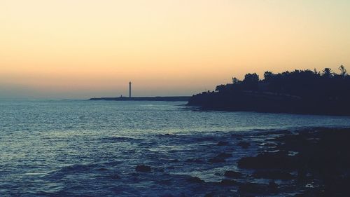 Scenic view of sea at sunset