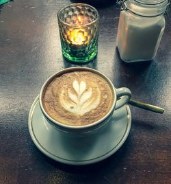 Close-up of coffee cup on table