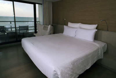 Sunlight falling on bed at home