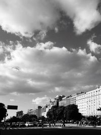 View of city against cloudy sky