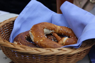 Close-up of sweet food in wicker basket on table