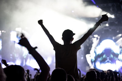 People enjoying at music concert