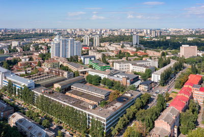 Aerial photography, landscape of a summer city from a bird's eye view flooded with sunlight.