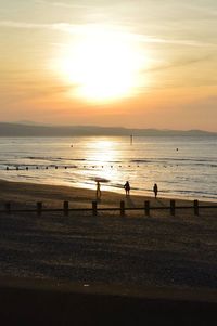 Scenic view of beach during sunset