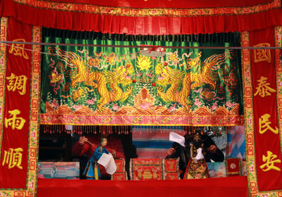 People at entrance of temple