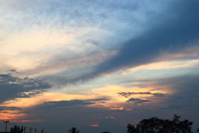 Low angle view of dramatic sky during sunset