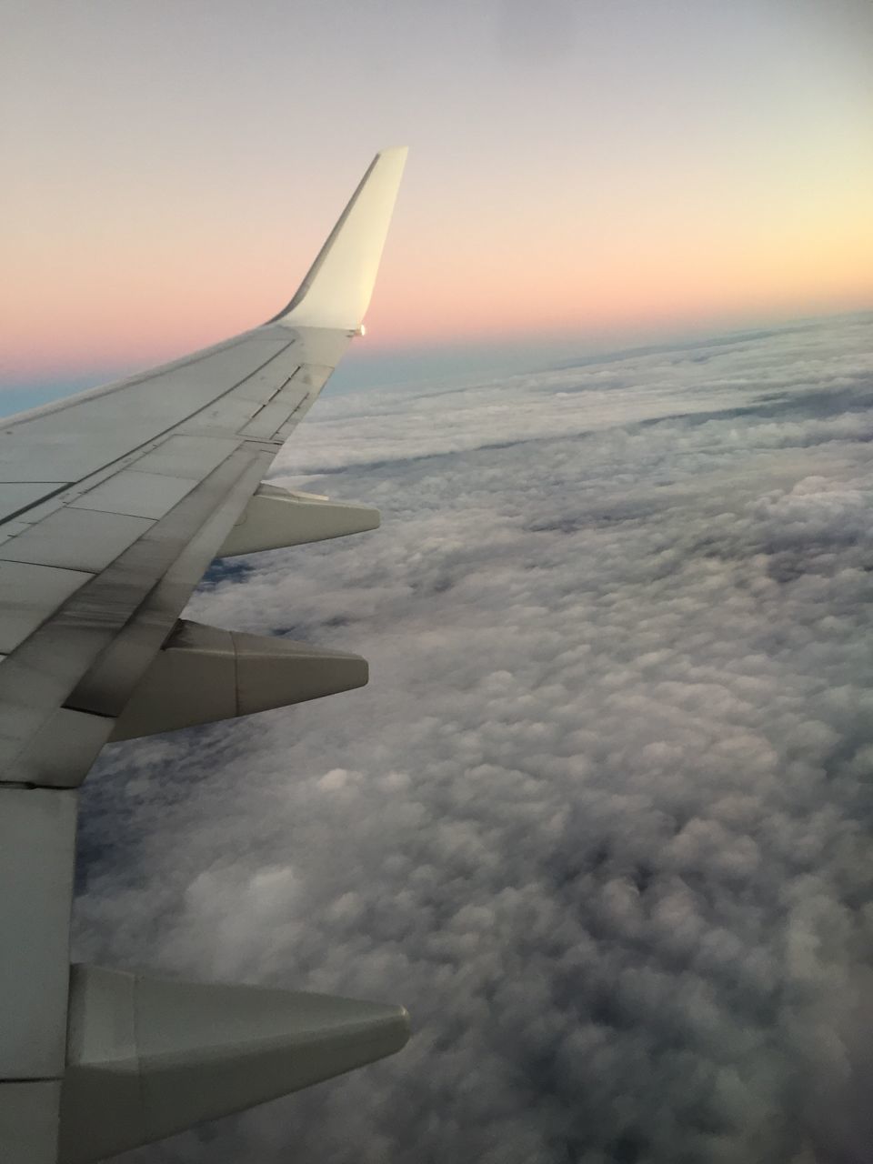 journey, transportation, airplane, nature, beauty in nature, sky, sunset, airplane wing, scenics, travel, cloud - sky, aircraft wing, aerial view, mode of transport, no people, tranquil scene, air vehicle, tranquility, flying, outdoors, horizon over water, day, close-up