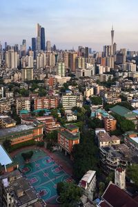 High angle view of buildings in city against sky