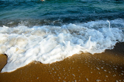 Waves splashing on shore