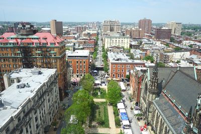 High angle view of street amidst buildings in city
