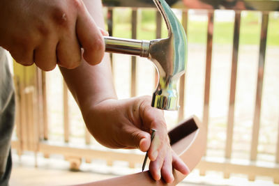 Close-up of person holding hands