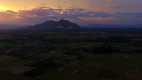 Scenic view of landscape against sky during sunset