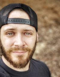 Close-up portrait of smiling young man