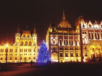Illuminated building at night