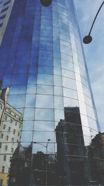 Low angle view of modern building against sky