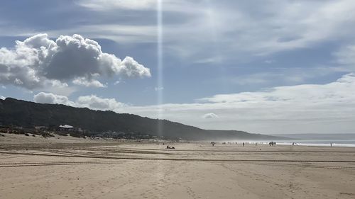 Scenic view of beach against sky