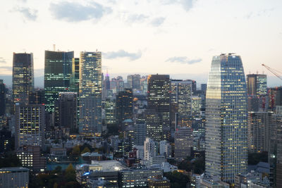 High angle view of buildings against sky in city