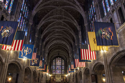 Low angle view of flags mounted in west point cadet chapel