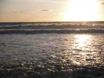 Scenic view of sea at sunset