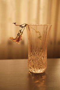 Close-up of glass of water on table