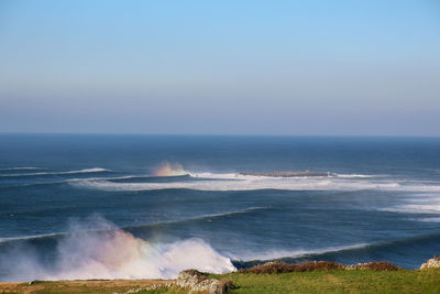 Scenic view of sea against clear sky