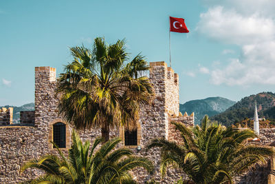 National flag of turkey on the castle wall in marmaris