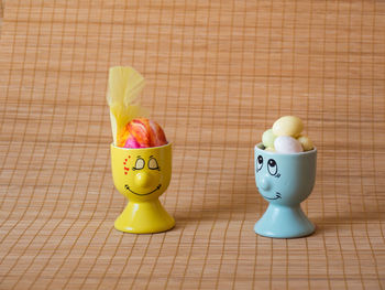 Close-up of easter eggs on wooden table