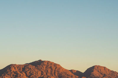 Scenic view of mountains against clear sky