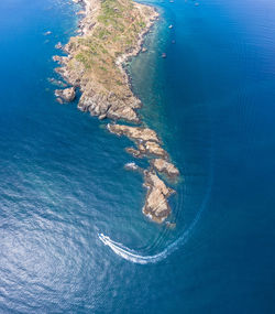 High angle view of island amidst sea