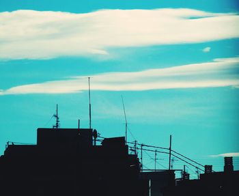 Low angle view of built structure against blue sky