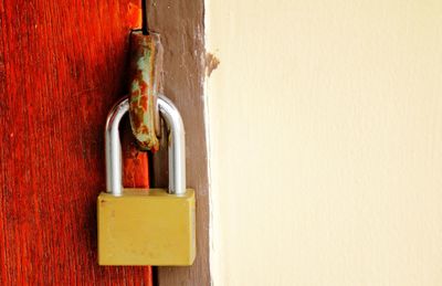 Close-up of padlock on door