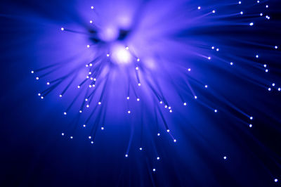 Close-up of illuminated fiber optic cables
