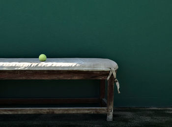 Ball on seat against wall