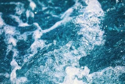 Close-up of water splashing in swimming pool