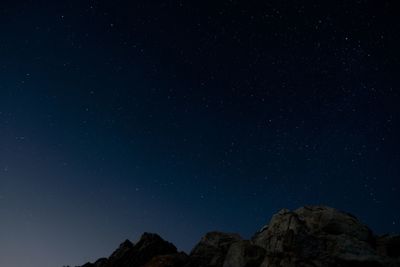 Low angle view of star field against sky at night