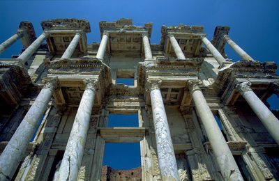 Low angle view of old building against sky