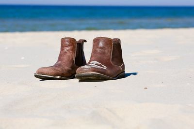 Leather boots on beach
