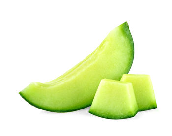 Close-up of green fruit against white background