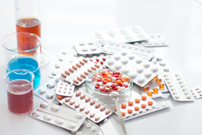 High angle view of medicines on white background