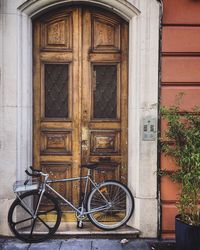 Bicycle against closed door