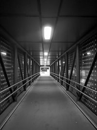 Empty footbridge at night