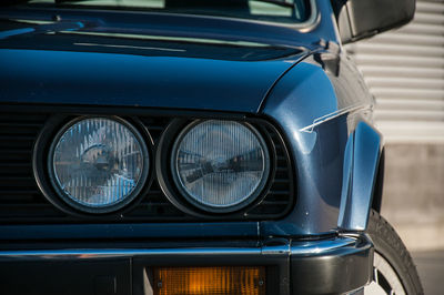 Close-up of blue car