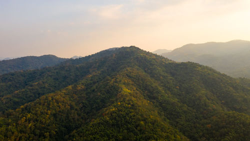 Scenic view of mountains against sky during sunset