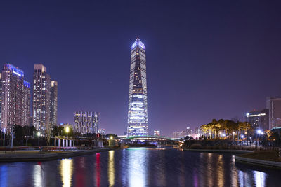 Illuminated buildings in city at night