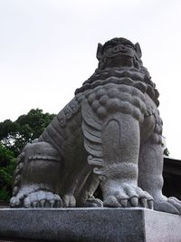 Low angle view of statue against clear sky
