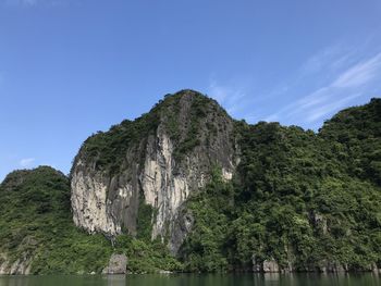 Low angle view of rocks against sky